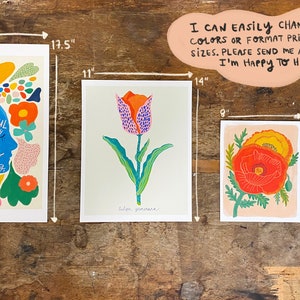 May include: Four colorful art prints with floral designs and inspirational quotes. The prints are framed and measure 13 inches by 17.5 inches, 11 inches by 14 inches, 9 inches by 10 inches, and 5 inches by 7 inches.