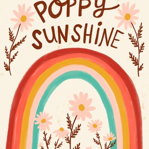 May include: A whimsical illustration featuring a rainbow with red, orange, yellow, and teal arches. The words "POPPY SUNSHINE" are written in brown script above the rainbow. Pink daisies and brown sprigs frame the design, creating a cheerful, vintage aesthetic.