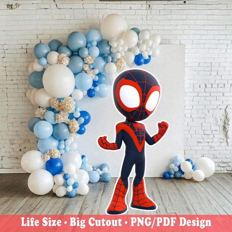 May include: A life-size cutout of a cartoon superhero in a black and red suit, with a spiderweb design on the mask. The background features a balloon arch in shades of blue and white. Text at the bottom reads: Life Size - Big Cutout - PNG/PDF Design.