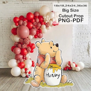 May include: A cutout prop featuring Winnie the Pooh holding a honey pot with the word "Hunny". The prop is surrounded by a balloon arch in shades of red, pink, and white. Text on the image reads "18x18, 24x24, 36x36 Big Size Cutout Prop PNG-PDF".