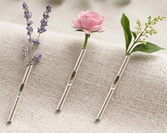 Spilla minimalista in argento a forma di vaso, accessorio floreale botanico moderno.