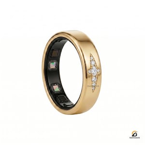 May include: A gold ring with a black inner band. The ring is adorned with a starburst pattern of small, clear gemstones. The ring has a smooth, polished surface and is set against a white backdrop.