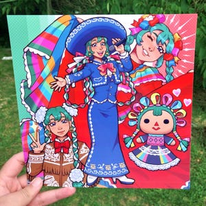 May include: A colorful illustration of a woman in a blue charro suit, holding a microphone. The artwork features multiple images of the woman, a doll, and a rainbow-colored shawl. The background is red and green.