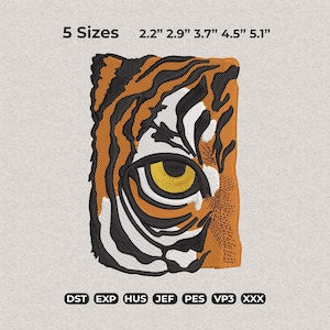 May include: An embroidered patch featuring a tiger's eye and part of its face, with orange, black, and white stripes. The eye is yellow and black. The patch is available in 5 sizes: 2.2", 2.9", 3.7", 4.5", and 5.1".