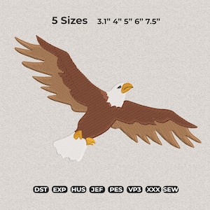 Peut inclure: Une broderie d'un aigle en vol, avec des plumes marron et beige, une tête blanche et un bec et des serres jaunes. Le texte indique cinq tailles : 7.9 cm, 10.2 cm, 12.7 cm, 15.2 cm et 19.1 cm. Des abréviations de format de fichier sont en dessous.