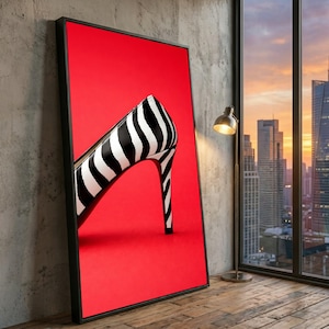 May include: A white ceramic mug with a black handle and the text "But First, Coffee" in a black, bold font. The mug is on a white surface.