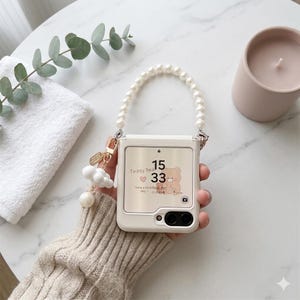 May include: A set of three ceramic mugs with a speckled, matte finish in cream, light grey, and dark grey. Each mug has a simple, minimalist design and a rounded handle.