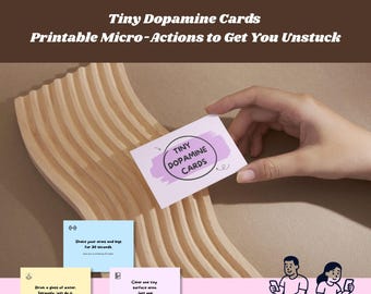 Może przedstawiać: Zestaw "Tiny Dopamine Cards" z tekstem "Printable Micro-Actions to Get You Unstuck". Karty są trzymane w dłoni i zawierają różne podpowiedzi, w tym "Shake your arms and legs for 30 seconds" i "Drink a glass of water."