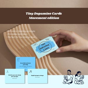 May include: A set of light blue Tiny Dopamine Cards Movement edition featuring 50 micro movement prompts. The cards display text including Go outside and move your body, Stretch your neck slowly left and right, and Single-leg squat attempt.