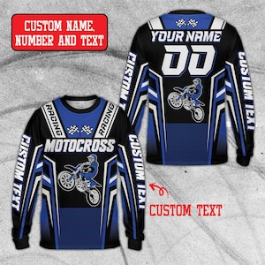 May include: A long-sleeve jersey featuring a black and blue geometric pattern, a graphic of a person on a motocross bike, and the text MOTOCROSS. The back displays YOUR NAME, the number 00, and CUSTOM TEXT. Includes checkered flag icons.