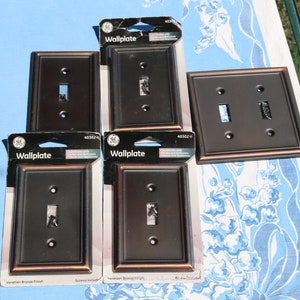 Set of Metal WALLPLATES Old Stock Black with Coppertone by GE Switch Plates