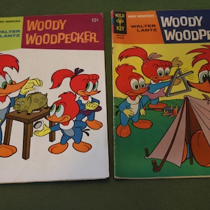 Gold Key Comic book Classics from the 1960s and 70s Woody Woodpecker 93,99 and Mickey Mouse and Goofy 135 and Donald Duck 136