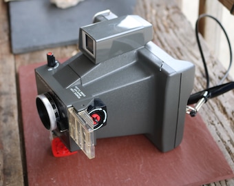 POLAROID LAND CAMERA Sparatutto quadrato in borsa con istruzioni originali anni '70