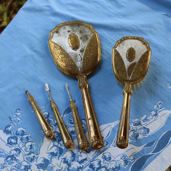 Art Deco Era BOUDOIR Beveled Hand Mirror Brush and a few Manicure Tools TARNISH Metal Gold & Silver