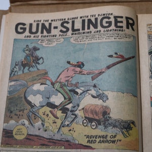 May include: A comic book cover featuring a Native American man on horseback, riding towards a covered wagon. The title of the comic is "Gun-Slinger" and the subtitle is "Revenge of Red Arrow!"