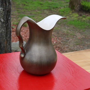 STUNNING Curves and  Lines on this  Mid Century HAEGER Pottery Pitcher Gold Toned Fininh with High Gloss on the Inside