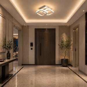 Peut inclure: Un couloir intérieur avec un sol en marbre, une porte en bois sombre et un luminaire moderne. Une console avec une lampe et des œuvres d'art est à gauche. Une étagère intégrée est à droite, et un arbre en pot est près de la porte.