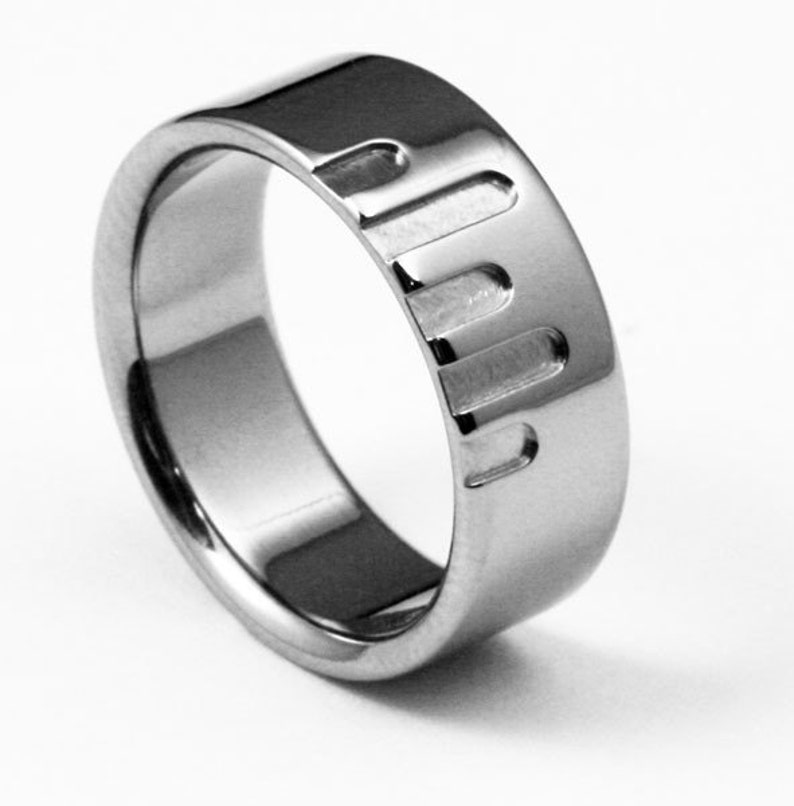 Titanium Ring with Flat Profile and Offset Horizontal Channels of Varied Lengths Metropolis image 1