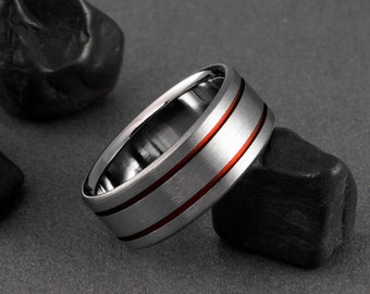 Hand made titanium band with two brilliant red pinstripes carved on either side