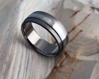Titanium Wedding Ring with a raised Solid Platinum Inlay in a Drop Down Edges Profile