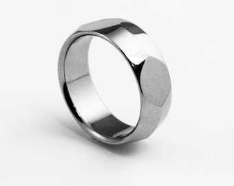Titanium Ring with Peaked Profile and Four Side Cutouts "Crucible"