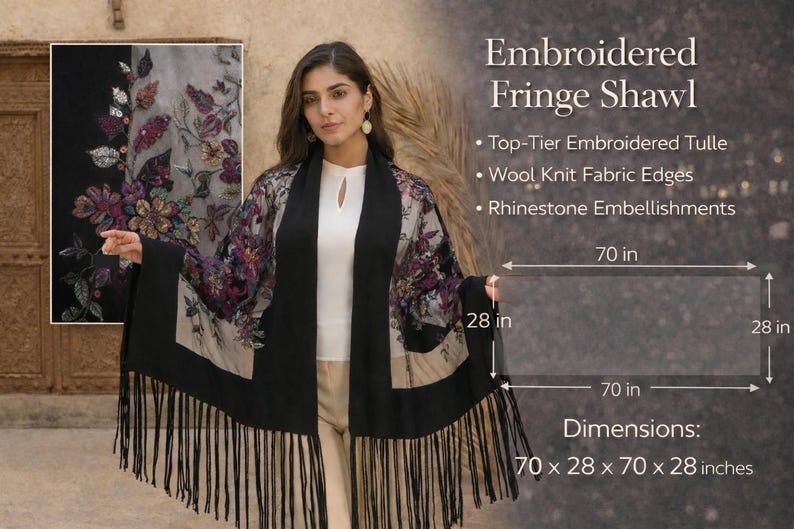 Embroidered fringe shawl with floral embroidery and black fringe. The shawl measures 70 x 28 x 70 x 28 inches. Features top-tier embroidered tulle, wool knit fabric edges, and rhinestone embellishments.
