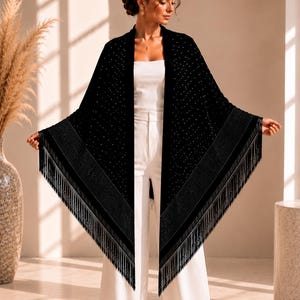 Front view of a handmade black velvet evening shawl with crystal embellishments and long fringe, elegant formal wrap for weddings and gala events.