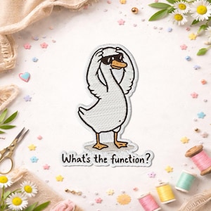 May include: Embroidered patch featuring a white goose wearing sunglasses, with the phrase "What's the function?" The goose is outlined in black and has yellow feet and beak. The patch is on a white background with decorative elements.