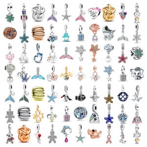 May include: A collection of assorted metal charms featuring various shapes including stars, animals, hearts, flowers, and geometric patterns, with some designs incorporating colourful enamel, crystals, and pearls, all designed for attachment to bracelets.