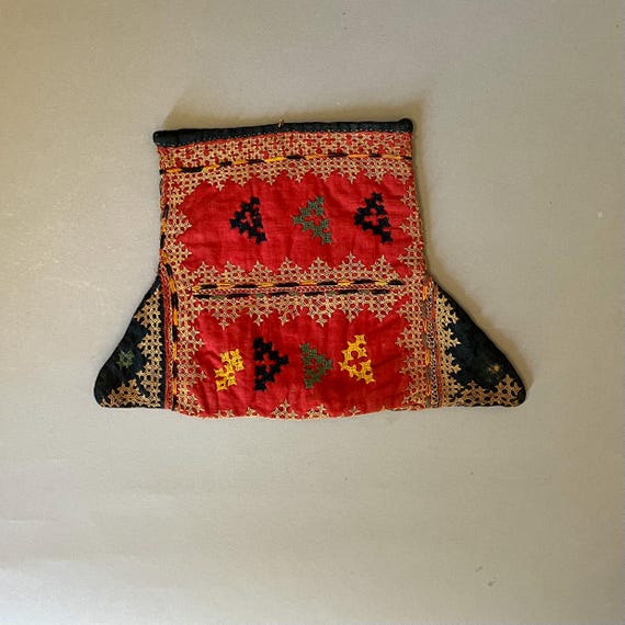 Antique Banjara embroidered pouch.