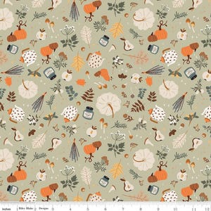 May include: A green fabric with a repeating pattern of pumpkins, teapots, leaves, and other fall-themed elements. The fabric is measured in inches.