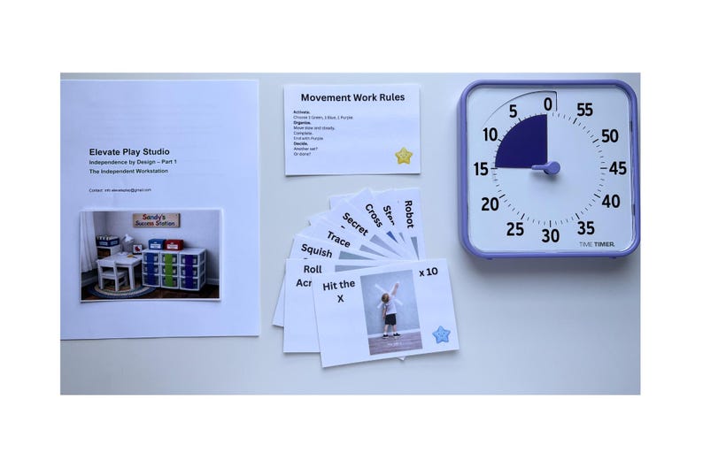 May include: An assortment of educational materials, including a timer, cards, and printed documents. The timer is square with a white face and a purple border. The cards have action words and images. The documents have text and a photo.