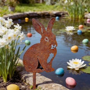 May include: A distressed wooden sign with the words "Welcome to our home" in white lettering. The sign has a rustic finish and a simple design, ideal for a front door.