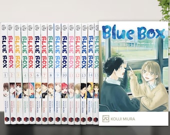 May include: A collection of manga volumes titled "Blue Box" by Kouji Miura. The spines display the title in blue and white, with volume numbers 1-15 visible. The cover of volume 20 features two illustrated characters. The books are arranged on a shelf.