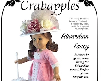 May include: A pink and white Edwardian Fancy dress for an 18-inch doll. The dress has lace trim and a white lace parasol. The doll is wearing a white hat with pink and white flowers. The text on the image reads "Edwardian Fancy" and "Inspired by gowns worn during the Edwardian period. Perfect for an Elegant Tea."