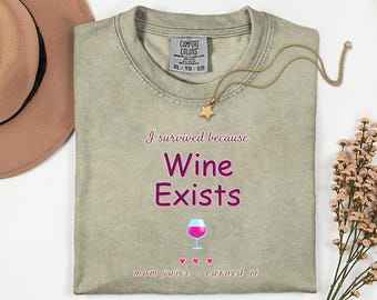 I Survived Because Wine Exists Shirt, Funny Mom Wine Tee, Mom Juice Graphic T-Shirt, Wine Lover Gift for Moms, Cute Pink Humor Shirt