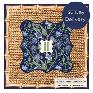 May include: A decorative square featuring a navy blue floral pattern with the letter "H" in a light green color. The design is set against a woven background with a bamboo-style border. The text "30 Day Delivery" is in a navy blue circle.