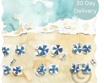 May include: Watercolor painting of a beach scene with blue and white striped umbrellas on the sand. The ocean waves are depicted in shades of blue and turquoise. The text "30 Day Delivery" is in a light blue circle.
