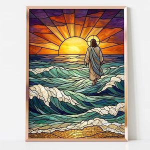 May include: A framed wall art print featuring a stained glass style illustration of a figure in robes walking on ocean waves toward a bright yellow sun. The scene includes deep blue and teal water, a golden sandy shore, and a vibrant sunset sky.