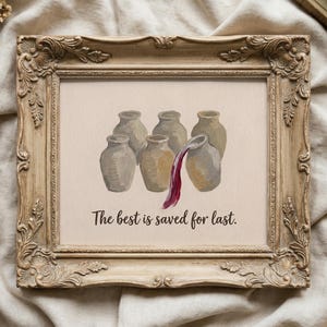May include: A framed print featuring an illustration of six tan ceramic jars arranged in two rows. One jar is tilted, pouring dark red liquid. Below the jars, the text reads, The best is saved for last. The frame is ornate, light brown, and textured.