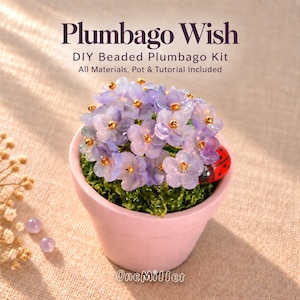 May include: A DIY beaded Plumbago kit featuring a light pink pot containing a cluster of translucent purple beaded flowers with gold centres and a small red ladybug with black spots. The text reads Plumbago Wish DIY Beaded Plumbago Kit.