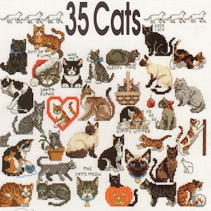 May include: A cross-stitch pattern titled 35 Cats featuring various feline illustrations in diverse poses and colors, including cats in a pumpkin, a basket, and a heart, with text labels like Santa Claws, Sleepy Time, and Out on a Limb.