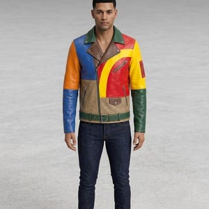 May include: A multi-colored leather motorcycle jacket featuring panels of orange, blue, brown, red, yellow, and green. The jacket includes a notched collar, an asymmetrical front zipper, two zippered chest pockets, a small flap pocket, and a belt.