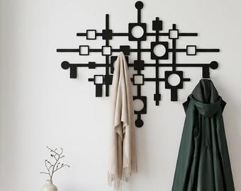 Lasergesneden stalen muurhanger: moderne geometrische kapstok, matzwarte afwerking