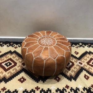 Genuine leather Moroccan ottoman handcrafted in Marrakech.