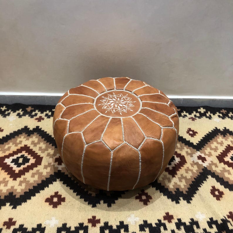 Genuine leather Moroccan ottoman handcrafted in Marrakech.