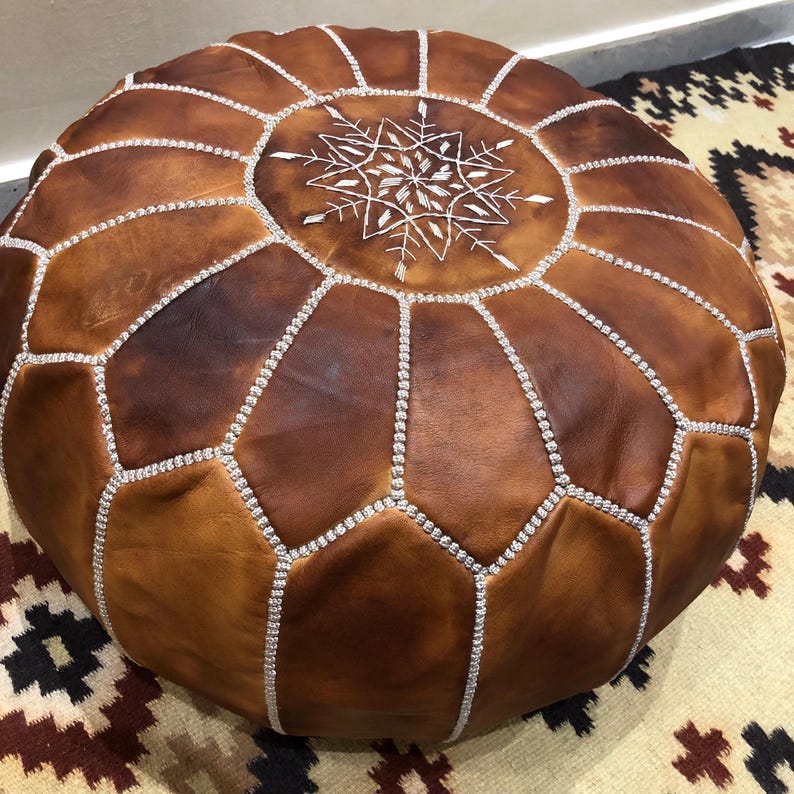 Unstuffed leather pouf ready for filling.