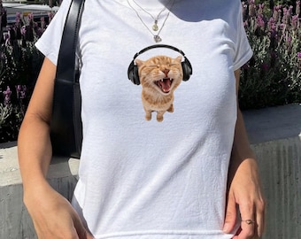 Y2K Headphones Cat Baby Tee | Retro Silly Cat Meme Shirt | 90s Aesthetic Kitten Tiny Tee | Funny Cat Music Graphic Crop Top | Coquette Style