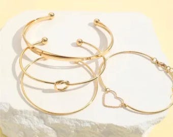 Vintage gouden set liefdesarmbanden met hart