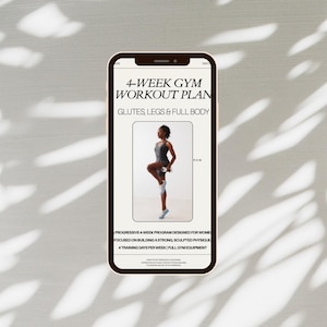 May include: A smartphone displays a 4-Week Gym Workout Plan. The plan focuses on glutes, legs, and full body workouts. The image shows a woman in athletic wear performing a leg lift with weights. The program is designed for building a strong, sculpted physique.